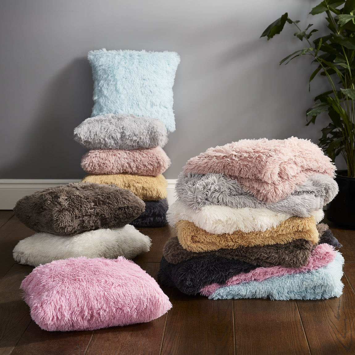 Catherine Lansfield Cuddly Faux Fur Filled Cushion 45cm x 45cm Blush Pink