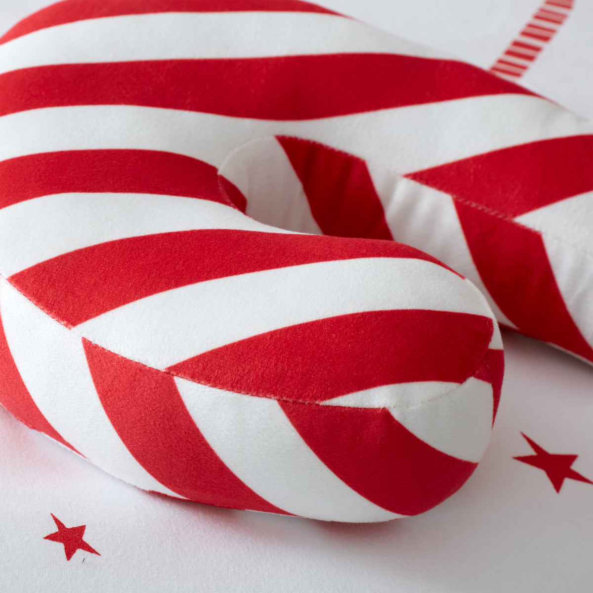 Catherine Lansfield Christmas Candy Cane Fleece 40cm x 23cm Filled Boudoir Red
