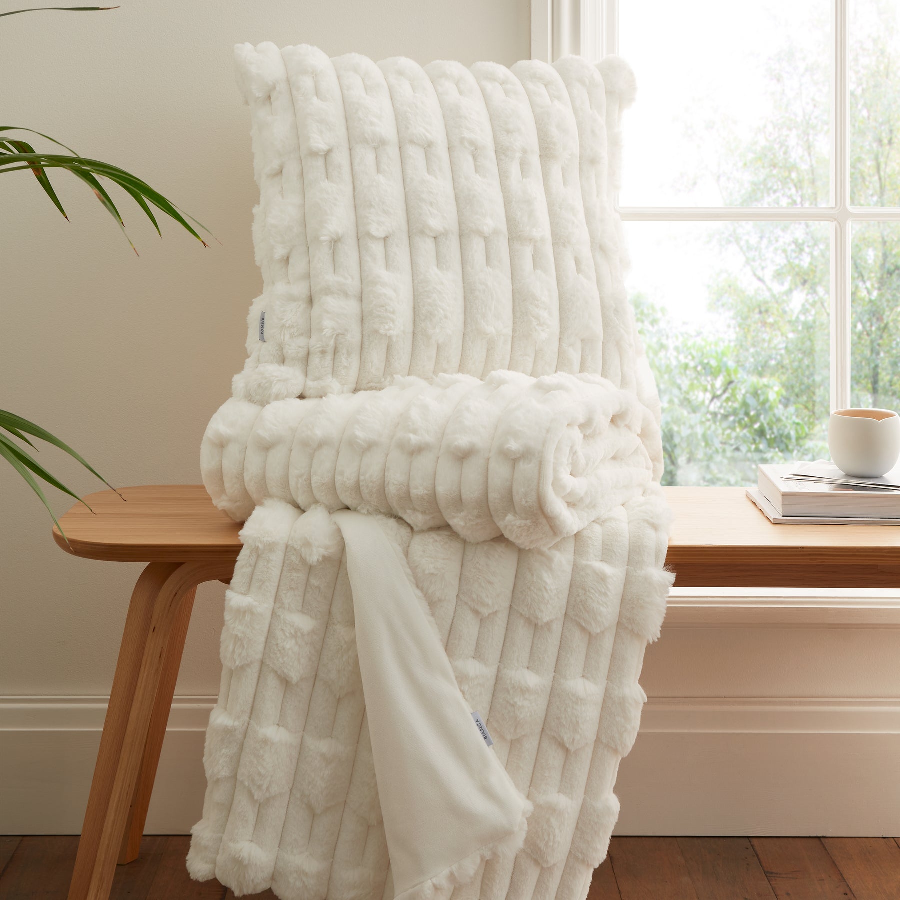 Bianca Carved Faux Fur Filled Cushion 50cm x 50cm Cream
