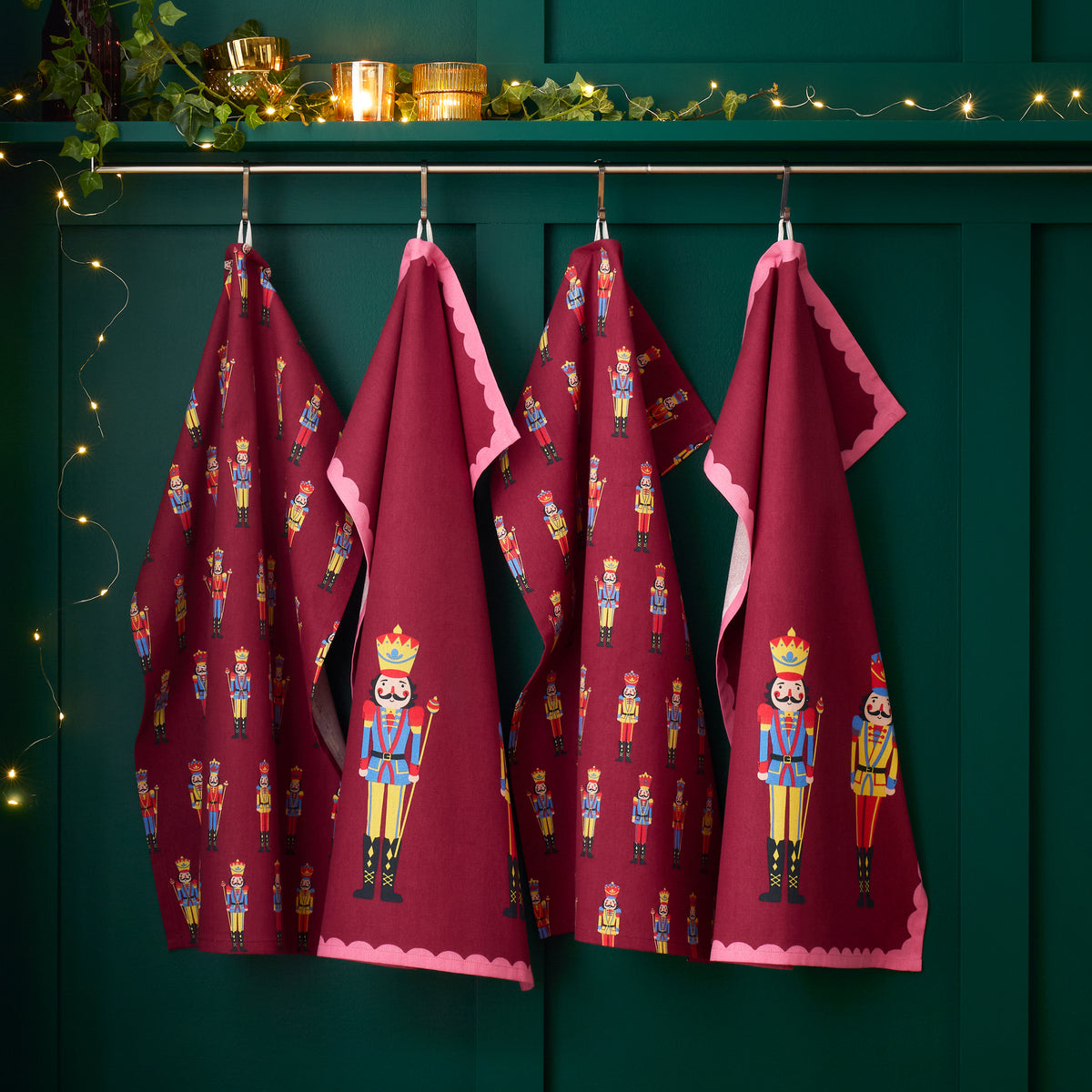 Catherine Lansfield Christmas Nutcracker Pack of Four Tea Towels Plum