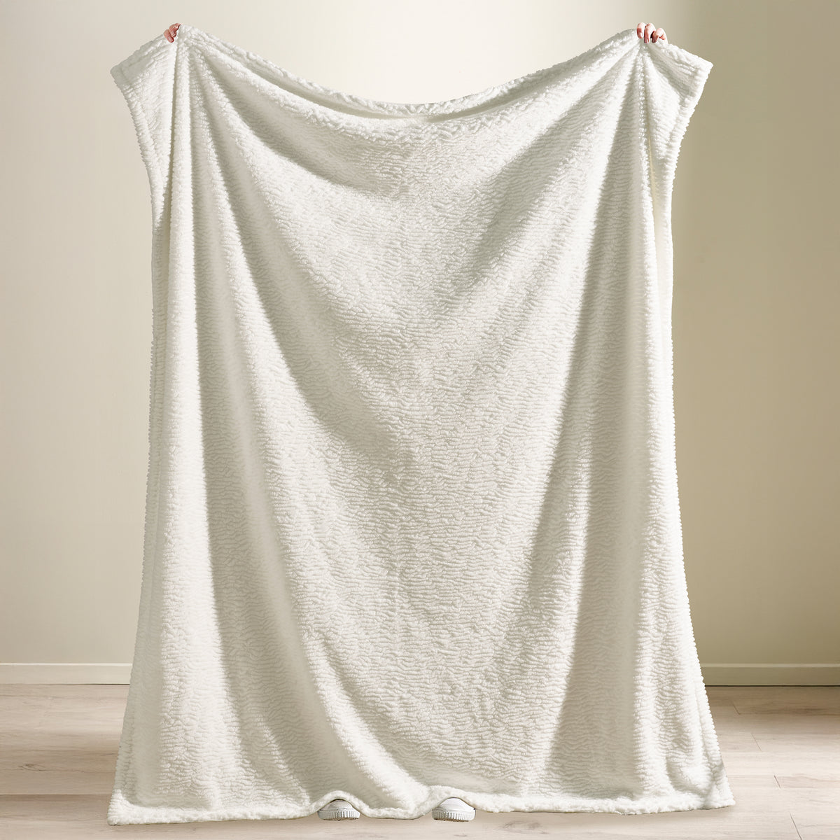 Catherine Lansfield Textured Wave Faux Fur Throw Cream