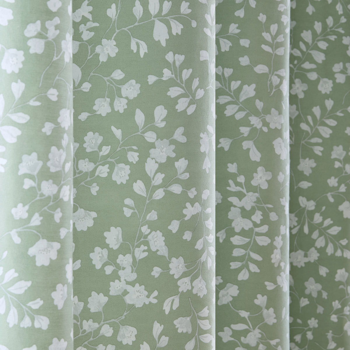 Catherine Lansfield Arla Floral Ready Made Eyelet Curtains Green